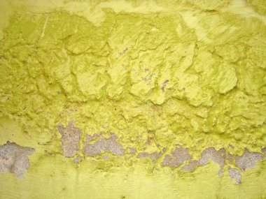 Eski duvarın arkasında bir taş deseni var.