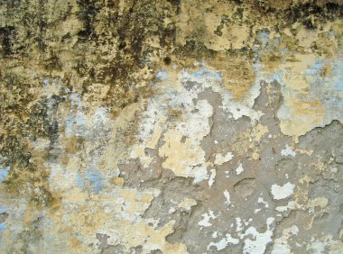 Eski duvarın arkasında bir taş deseni var.