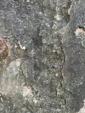 Doku, duvar, beton, arka plan olarak kullanılabilir. Çizik ve çatlaklarla dolu bir duvar parçası.