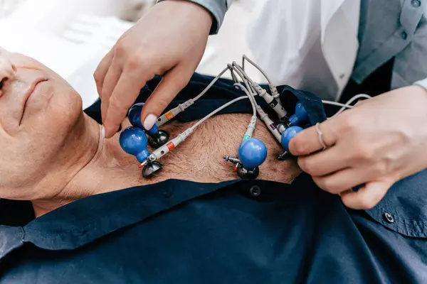 Experienced Doctor Putting Electrodes Ecg Machine Bare Torso Senior Male — Stock Photo, Image