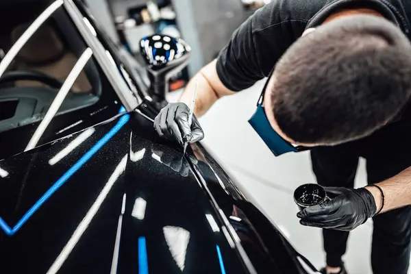 Professional Worker Fixing Luxury Car Scratches Car Detailing Valeting Service Stock Picture