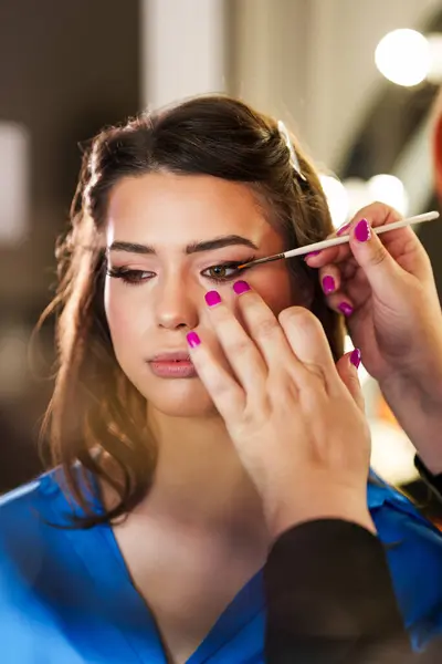 Professional Beautician Applying Makeup Beautiful Young Woman Face Professional Make Stock Image