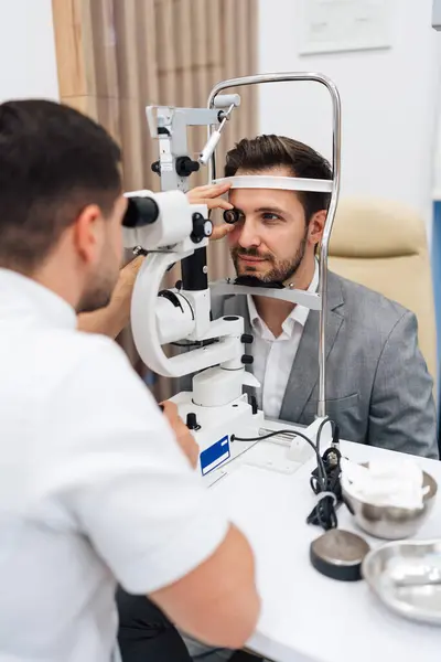 Attractive Male Doctor Ophthalmologist Checking Eye Vision Handsome Middle Age Stock Picture