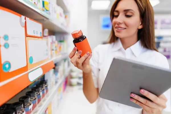 Beautiful Pharmacist Working Standing Drug Store Doing Stock Take Portrait Stock Picture