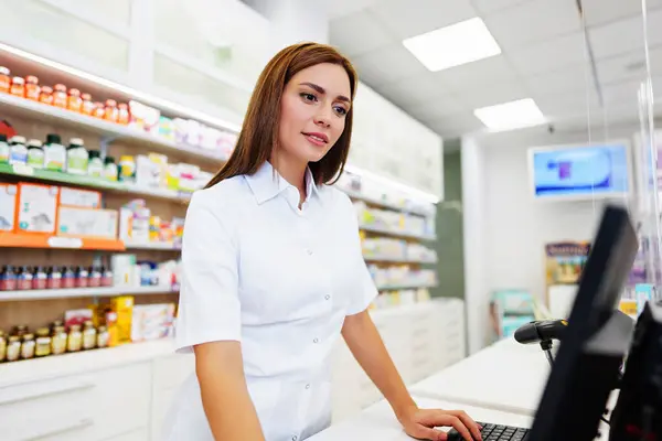 Beautiful Pharmacist Working Standing Drug Store Doing Stock Take Portrait Royalty Free Stock Images
