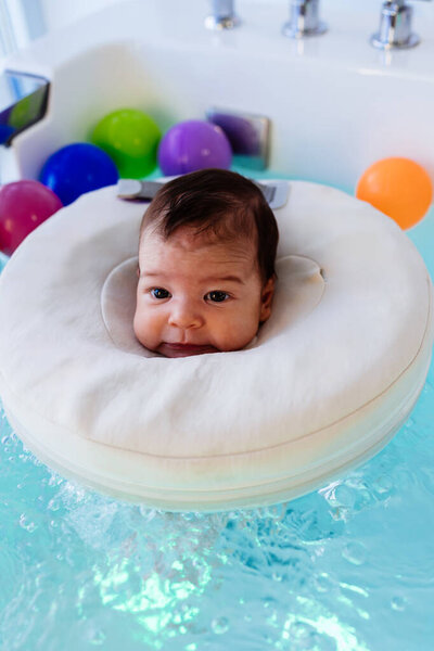 Small Child Baby Swimming Having Pleasant Time Physical Therapy Session Royalty Free Stock Images