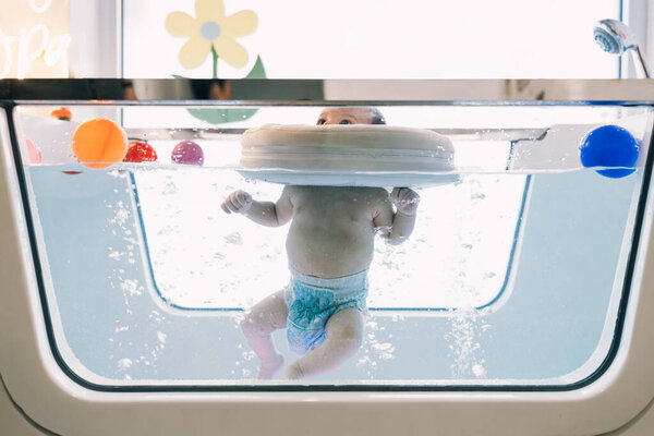 Small Child Baby Swimming Having Pleasant Time Physical Therapy Session Stock Image