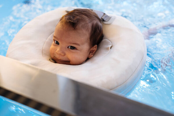 Small Child Baby Swimming Having Pleasant Time Physical Therapy Session Stock Image