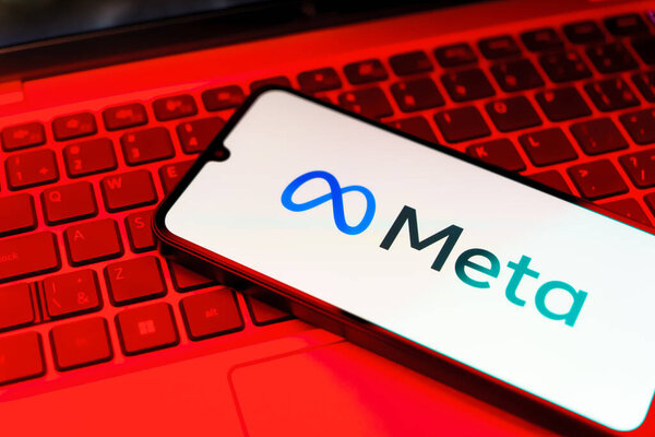 Prague, Czechia: Modern smartphone  with  meta   logo on laptop computer