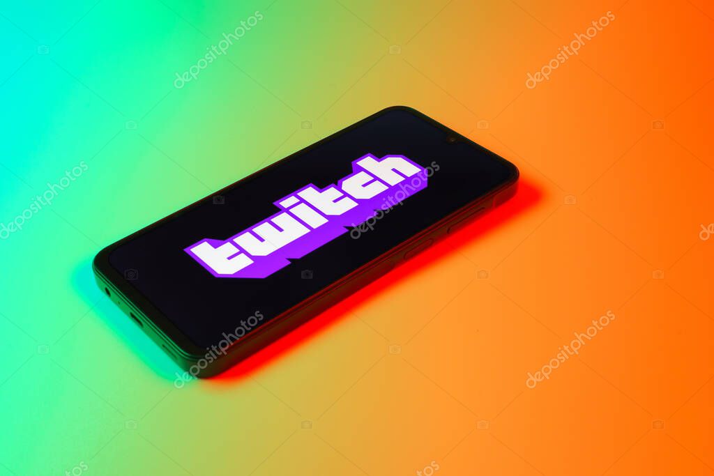 Prague, Czechia - 10 21 2024: Smartphone on surface showing Twitch logo