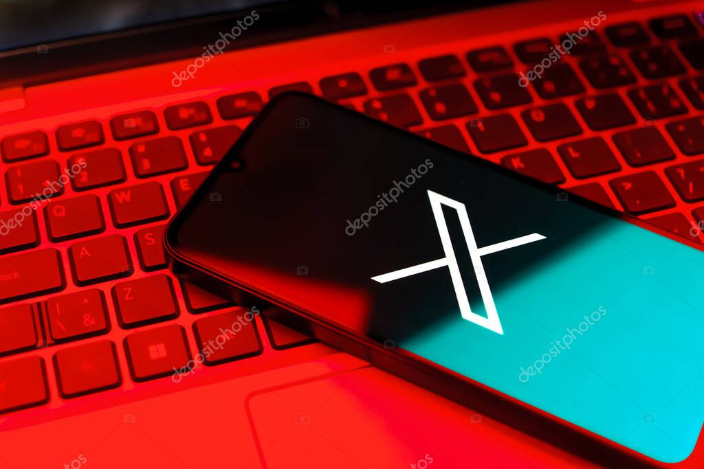Prague, Czechia - 8 20 2024: Smartphone on surface showing social network X logo.