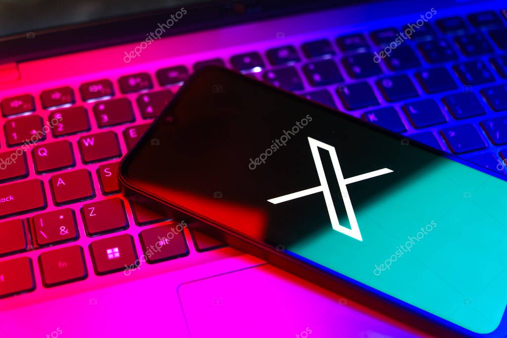 Prague, Czechia - 8 20 2024: Smartphone on surface showing social network X logo.
