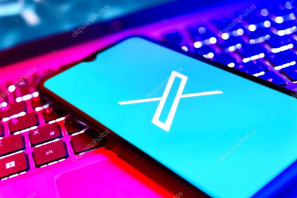 Prague, Czechia - 8 20 2024: Smartphone on surface showing social network X logo.