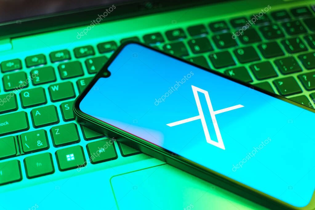 Prague, Czechia - 8 20 2024: Smartphone on surface showing social network X logo