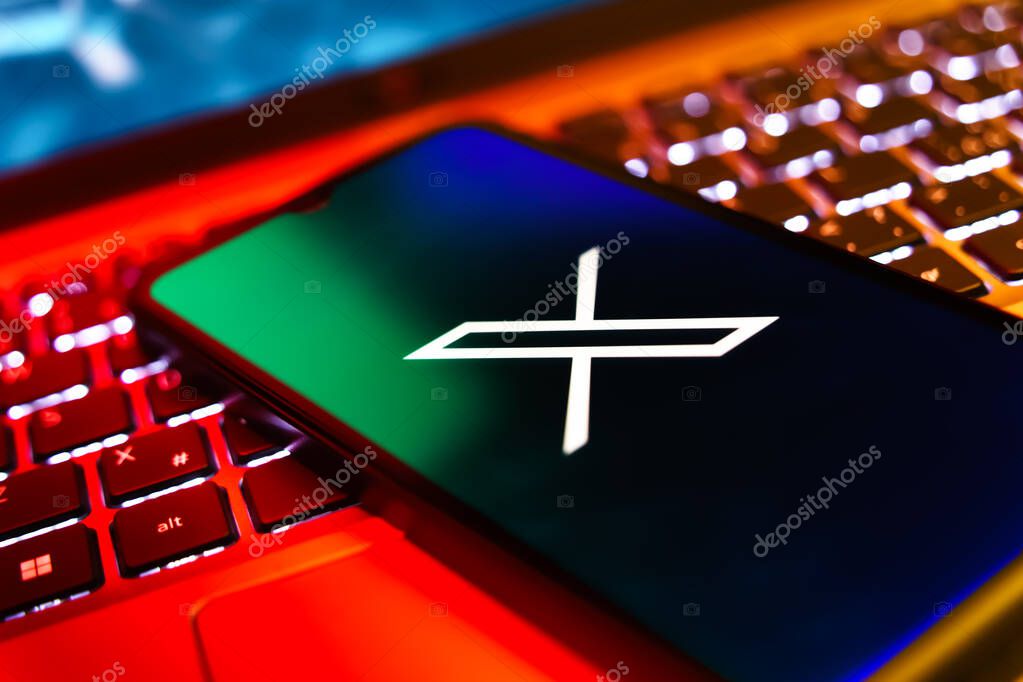 Prague, Czechia - 8 20 2024: Smartphone on surface showing social network X logo.