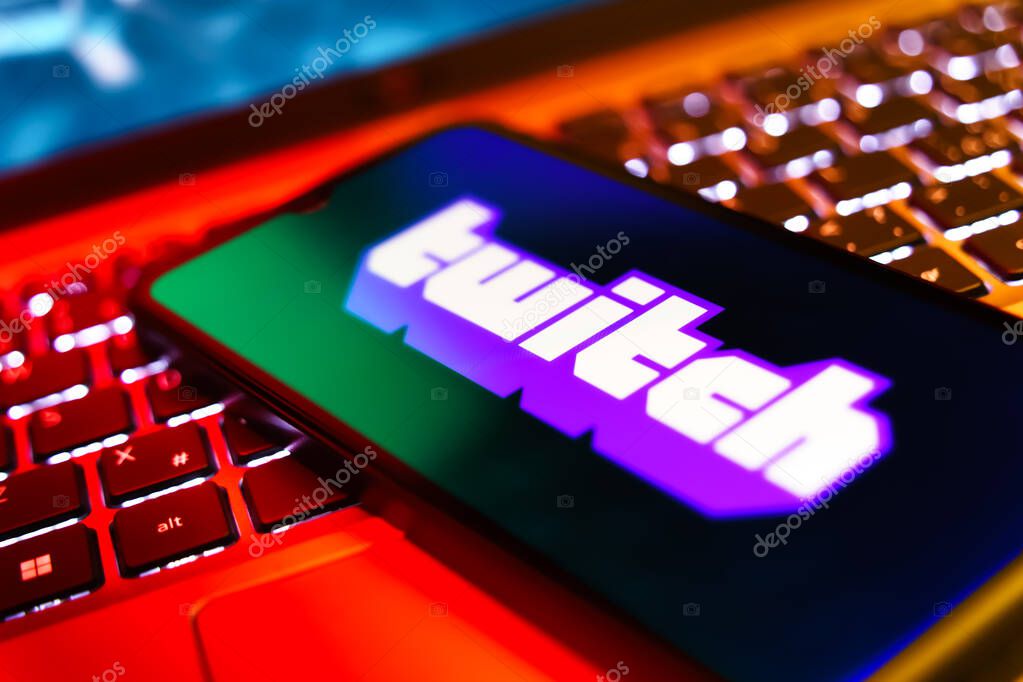 Prague, Czechia - 10 21 2024: Smartphone on surface showing Twitch logo