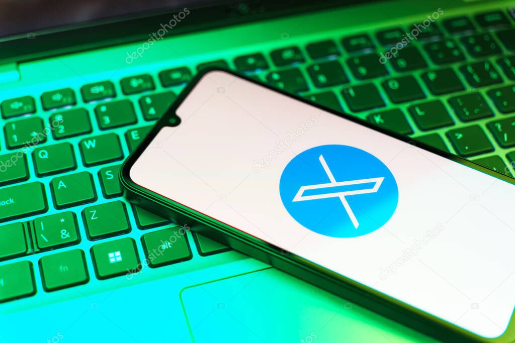 Prague, Czechia - 8 20 2024: Smartphone on surface showing social network X logo.
