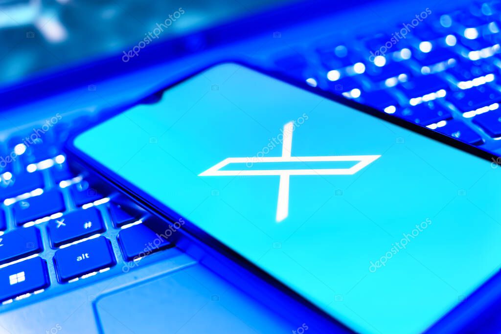 Prague, Czechia - 8 20 2024: Smartphone on surface showing social network X logo.