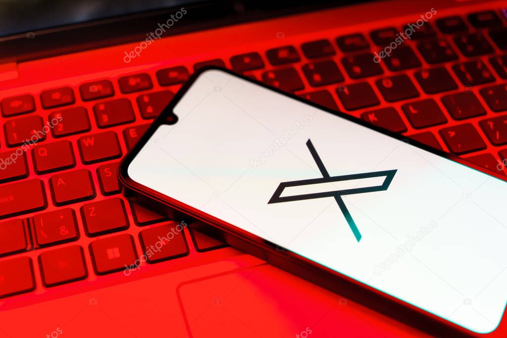 Prague, Czechia - 8 20 2024: Smartphone on surface showing social network X logo