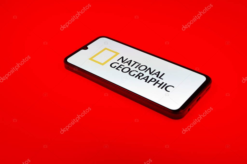 Prague, Czechia - 10 21 2024: Smartphone on surface showing National Geographic logo.