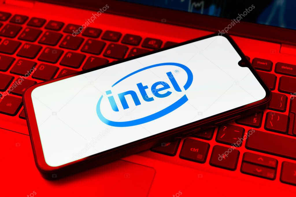 Prague, Czechia - 10 21 2024: Smartphone on surface showing Intel logo.