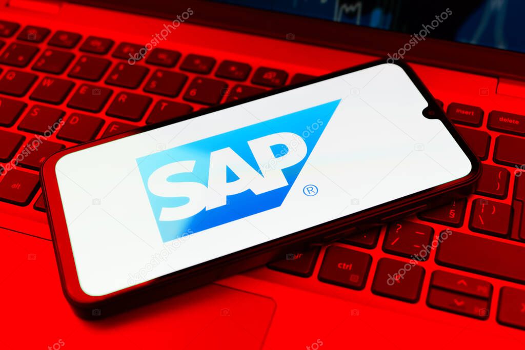 Prague, Czechia - 10 21 2024: Smartphone on surface showing SAP logo.