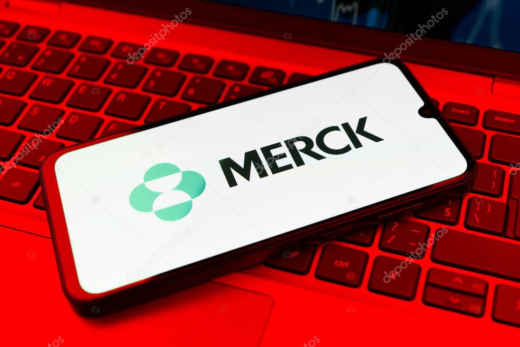 Prague, Czechia - 10 21 2024: Smartphone on surface showing Merck logo.