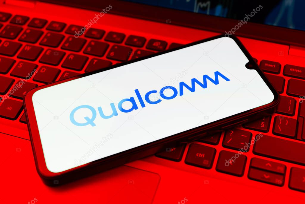 Prague, Czechia - 10 21 2024: Smartphone on surface showing Qualcomm logo.