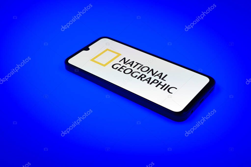 Prague, Czechia - 10 21 2024: Smartphone on surface showing National Geographic logo.