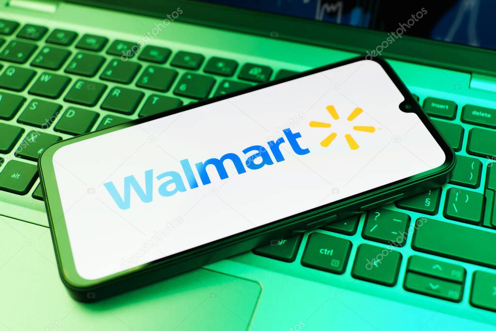 Prague, Czechia - 10 21 2024: Smartphone on surface showing Walmart logo.