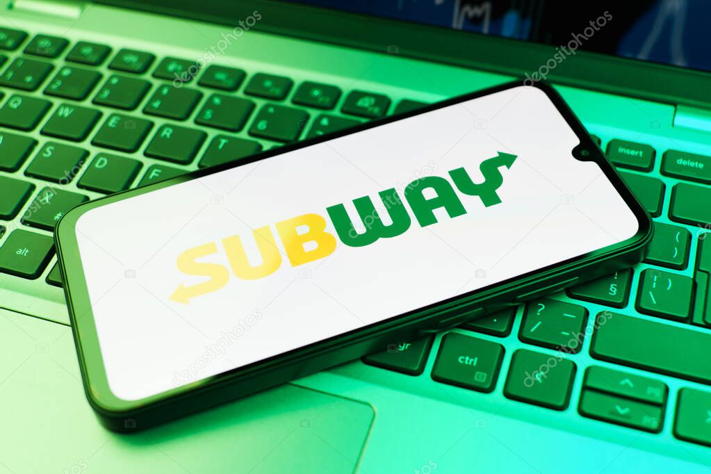 Prague, Czechia - 10 21 2024: Smartphone on surface showing Subway logo.