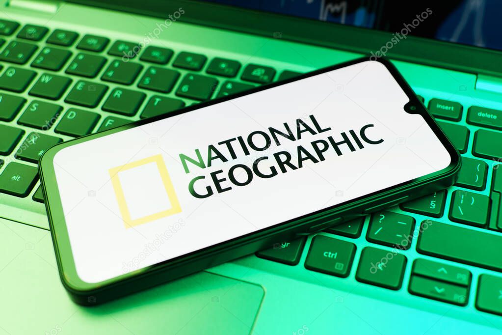 Prague, Czechia - 10 21 2024: Smartphone on surface showing National Geographic logo.