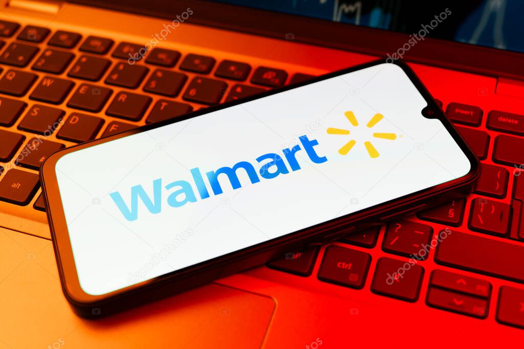 Prague, Czechia - 10 21 2024: Smartphone on surface showing Walmart logo.
