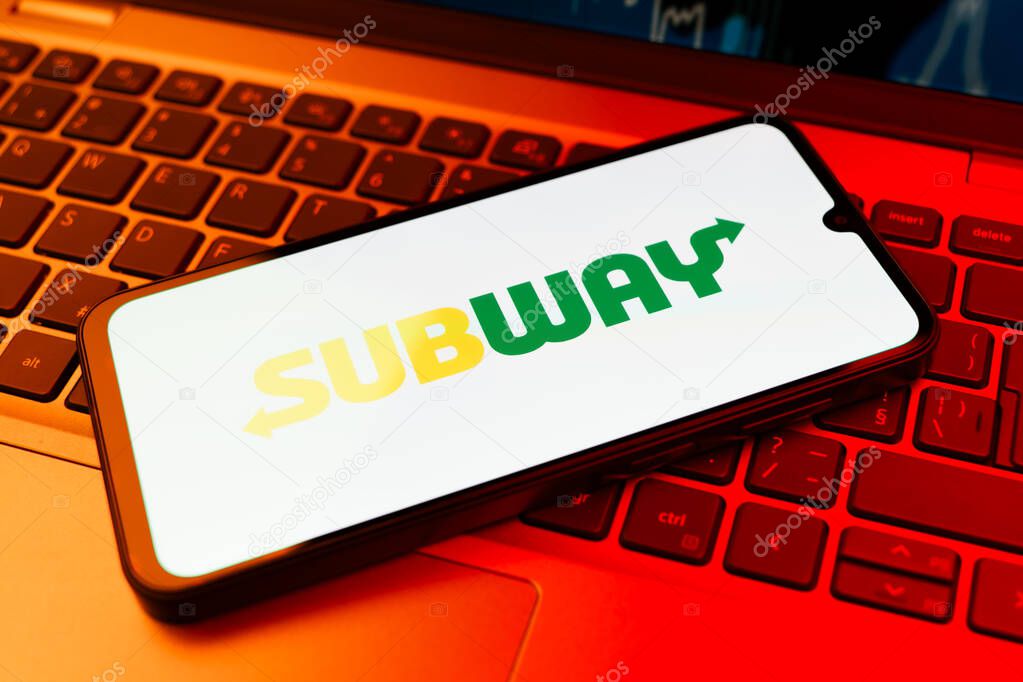 Prague, Czechia - 10 21 2024: Smartphone on surface showing Subway logo.