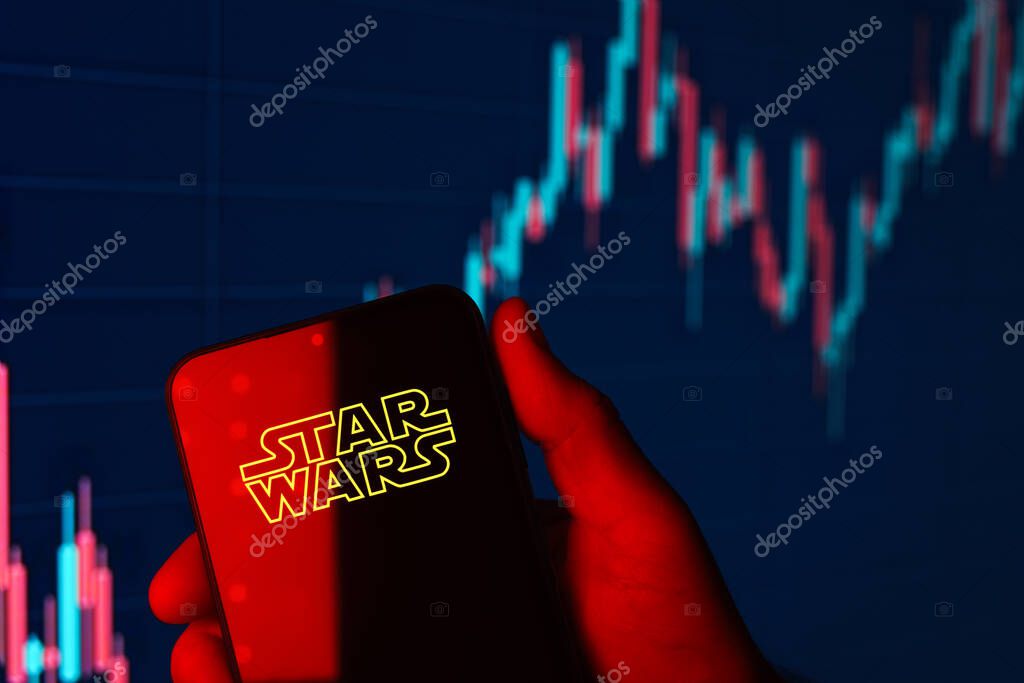 Prague, Czechia - 10 21 2024: Smartphone on surface showing Star Wars logo.