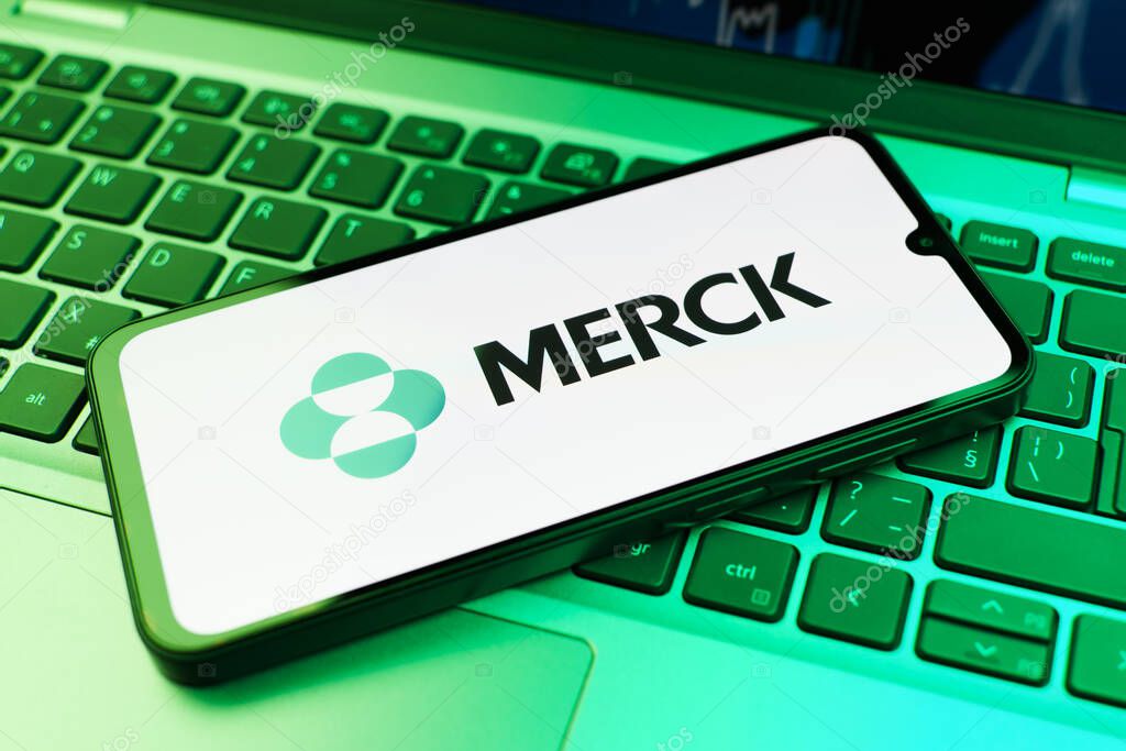 Prague, Czechia - 10 21 2024: Smartphone on surface showing Merck logo.