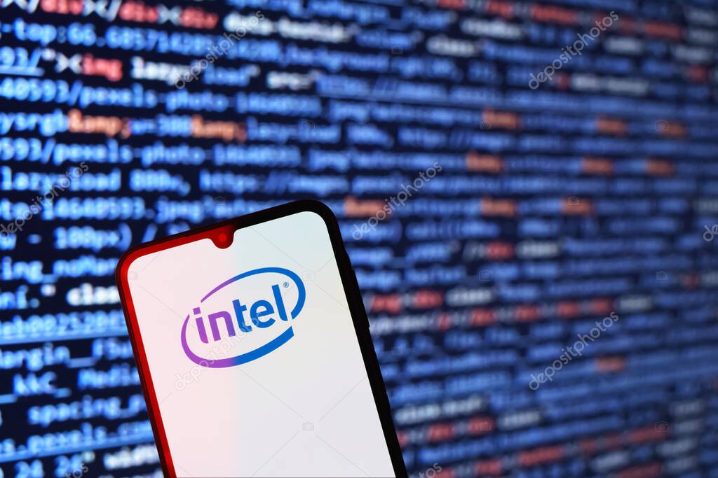 Prague, Czechia - 10 21 2024: Smartphone on surface showing Intel logo.