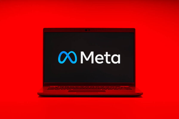 Prague, Czechia - October 21, 2024: Modern laptop screen on surface background showing meta logo