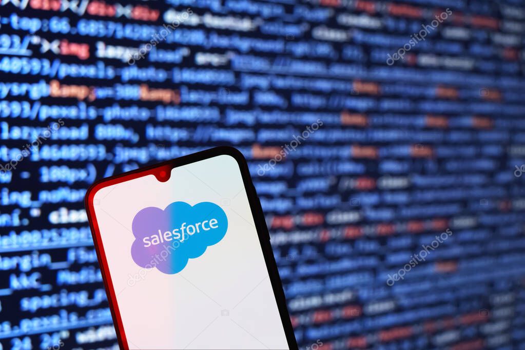 Prague, Czechia - 10 21 2024: Smartphone on surface showing Salesforce logo.