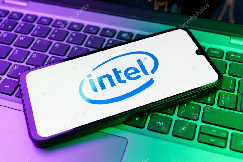 Prague, Czechia - 10 21 2024: Smartphone on surface showing Intel logo.