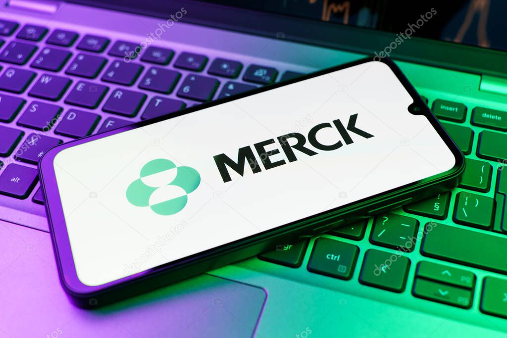Prague, Czechia - 10 21 2024: Smartphone on surface showing Merck logo.