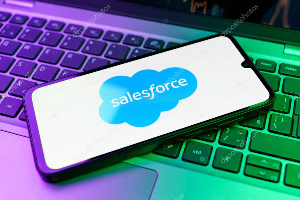 Prague, Czechia - 10 21 2024: Smartphone on surface showing Salesforce logo.