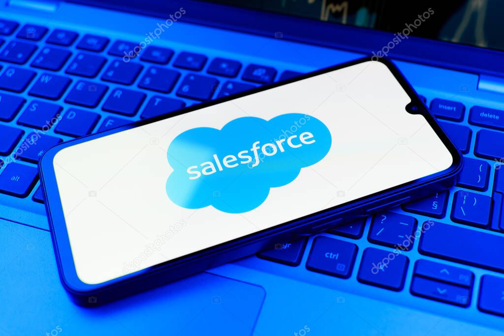 Prague, Czechia - 10 21 2024: Smartphone on surface showing Salesforce logo.