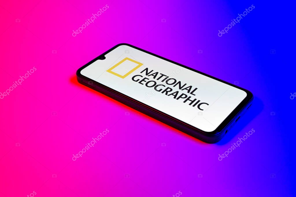 Prague, Czechia - 10 21 2024: Smartphone on surface showing National Geographic logo.