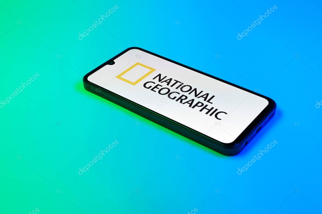Prague, Czechia - 10 21 2024: Smartphone on surface showing National Geographic logo.