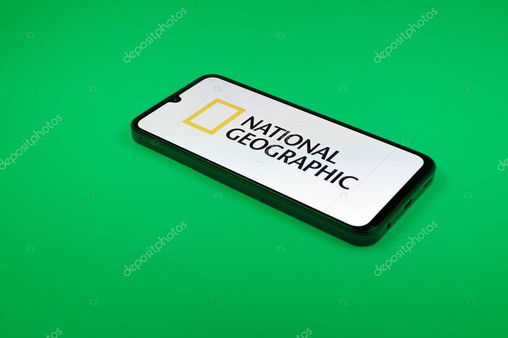 Prague, Czechia - 10 21 2024: Smartphone on surface showing National Geographic logo.