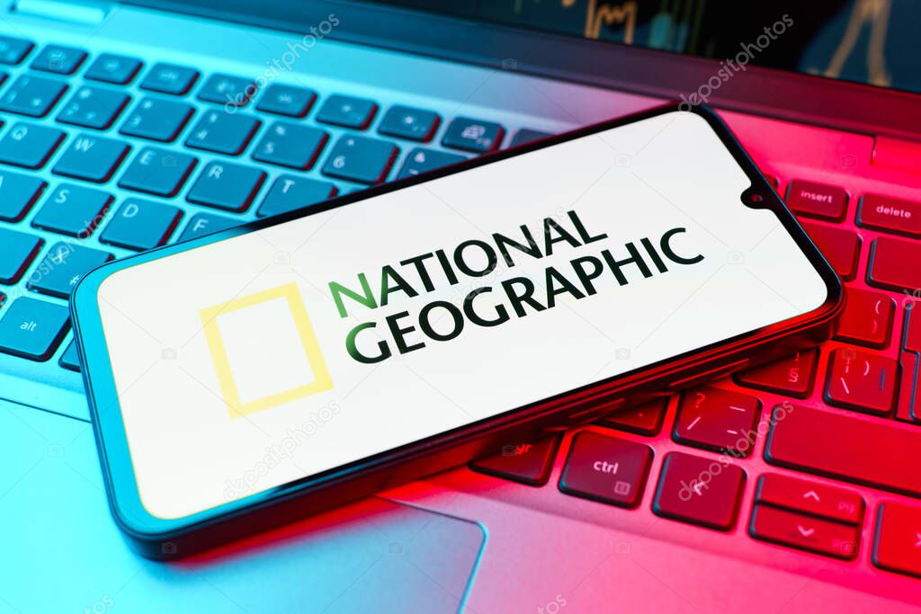 Prague, Czechia - 10 21 2024: Smartphone on surface showing National Geographic logo.