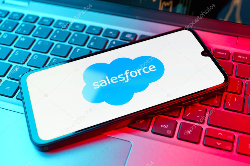 Prague, Czechia - 10 21 2024: Smartphone on surface showing Salesforce logo.