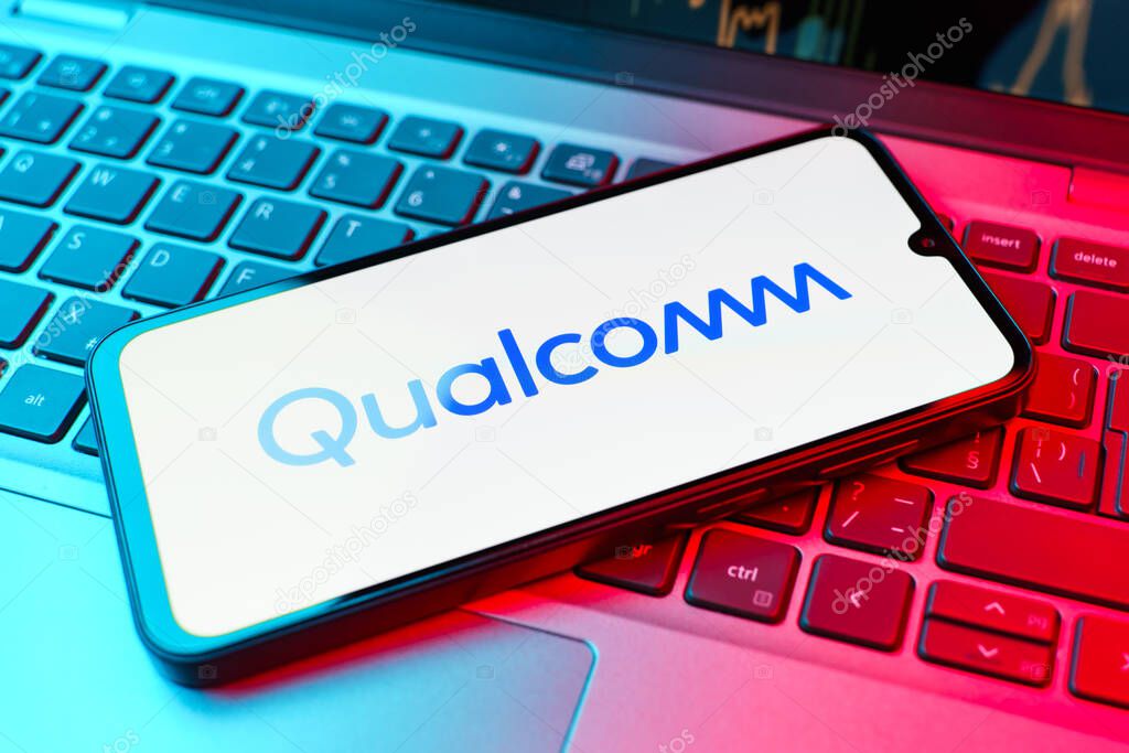 Prague, Czechia - 10 21 2024: Smartphone on surface showing Qualcomm logo.