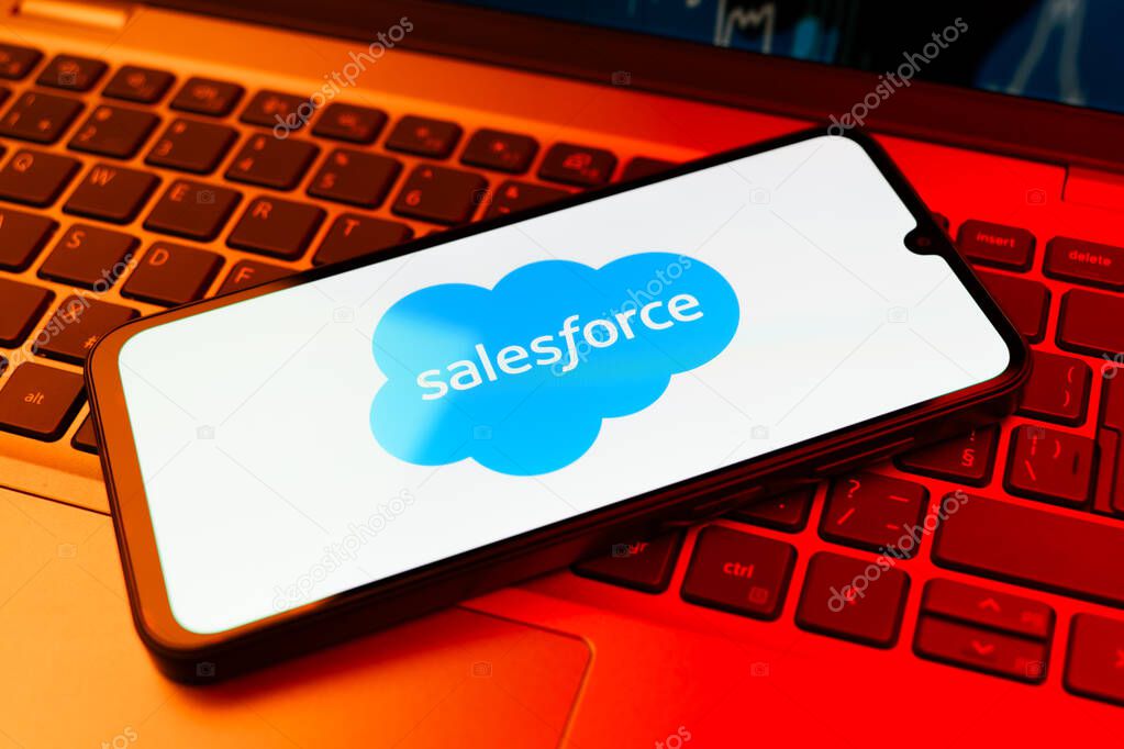 Prague, Czechia - 10 21 2024: Smartphone on surface showing Salesforce logo.